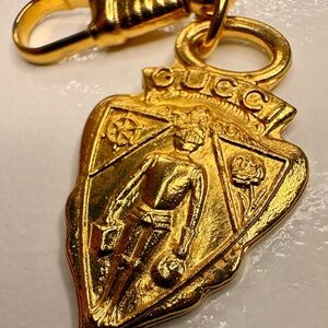 SOLD
Authentic GUCCI Vintage Gold Crest Armored Medieval Knight Pendant Charm